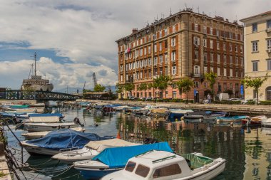 RIJEKA, CROATIA - MAY 23, 2019: Small boats at Mrtvi canal and old buildings in Rijeka, Croatia