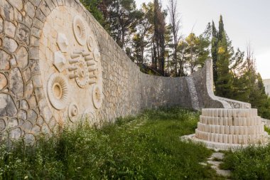 MOSTAR, BOSNIA AND HERZEGOVINA - JUNE 10, 2019: Crumbling Partisan's Cemetery in Mostar, Bosnia and Herzegovina