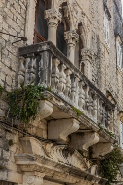 Windows of Cippiko Palace in the old town of Trogir, Croatia