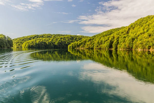 Boat wake at Kozjak lake in Plitvice Lakes National Park, Croatia