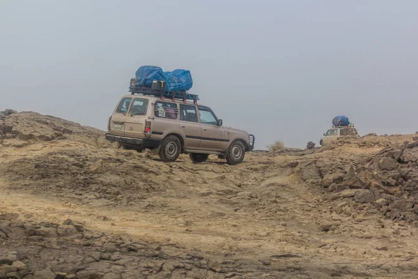 Afar Ethiopia March 2019 Vehicles Crossing Lava Fields Way Erta — Stock Photo, Image