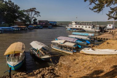 BAHIR DAR, ETHIOPIA - MARCH 31, 2019: Small boats in Bahir Dar, Ethiopia
