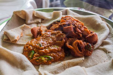 Breakfast in Ethiopia - injera with shiro sauce and injera fir fir
