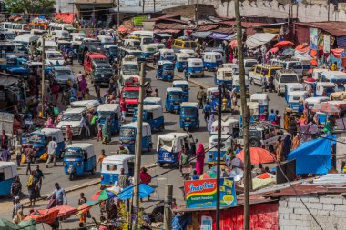 HARAR, ETHIOPIA - APRIL 8, 2019: Aerial view of road traffic with tuk tuks (bajaj) in Harar, Ethiopia