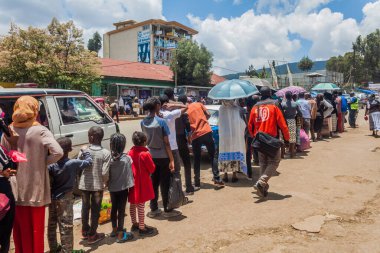ADDIS ABABA, ETHIOPIA - APRIL 6, 2019: People are waiting for a minibus in Addis Ababa, Ethiopia