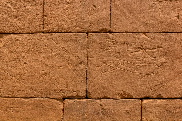 Ancient carvings in the walls of the Great Enclosure of Musawwarat es-Sufra (Musawarat Al-Sufra) in Sudan