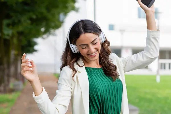 Carefree Woman Dancing While Listening Music Wireless Headphones — Stock Photo, Image