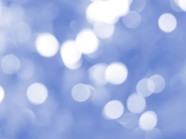 Blå jul bakgrund med bokeh lampor — Stockfoto