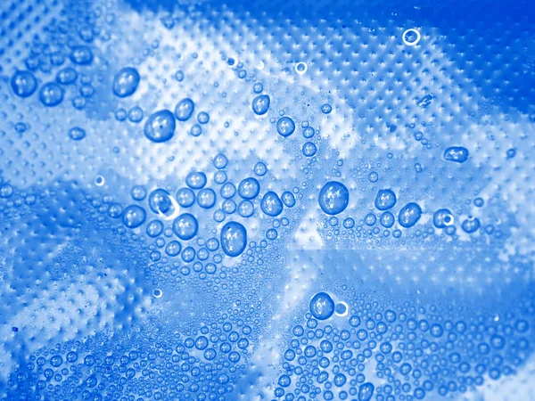 Condensation and drops on a Plastic with touches of color — Stock Photo, Image