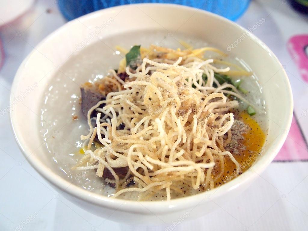 Traditional chinese porridge rice gruel in bowl, congee.
