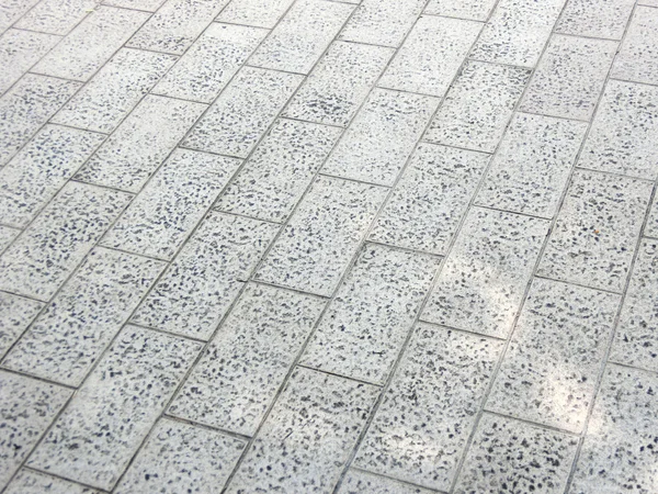 Döşeme arka planı gri Arnavut kaldırımı taşları — Stok fotoğraf