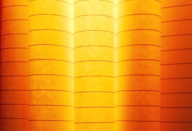 macro image of colorful curved sheets of paper shaped like a fan, on orange background clipart