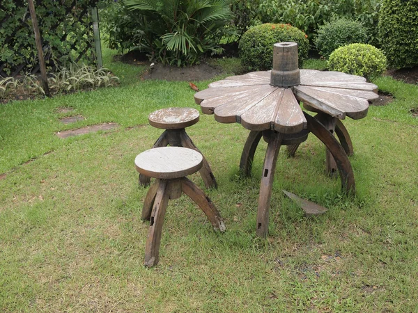 Wooden lawn chairs in the garden — Stock Photo, Image