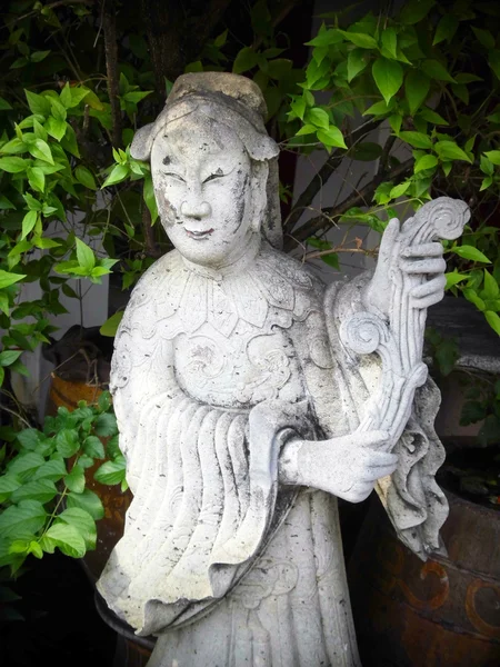 BANGKOK, THAILAND - January 4: Chinese Statue on 4 January 2012 at ancient buddhist Temple (Wat Pho), Bangkok, Thailand — Stock Photo, Image