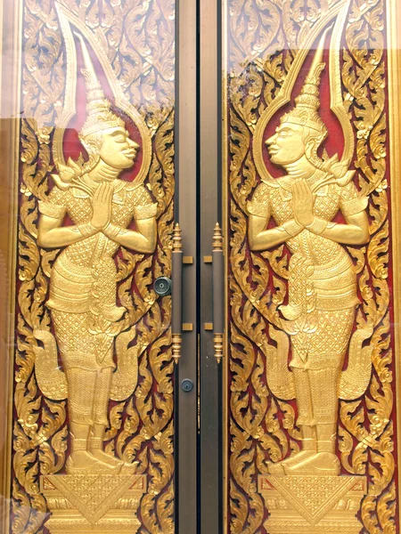 Motif dans la peinture d'art de style thaïlandais traditionnel sur la porte du temple — Photo