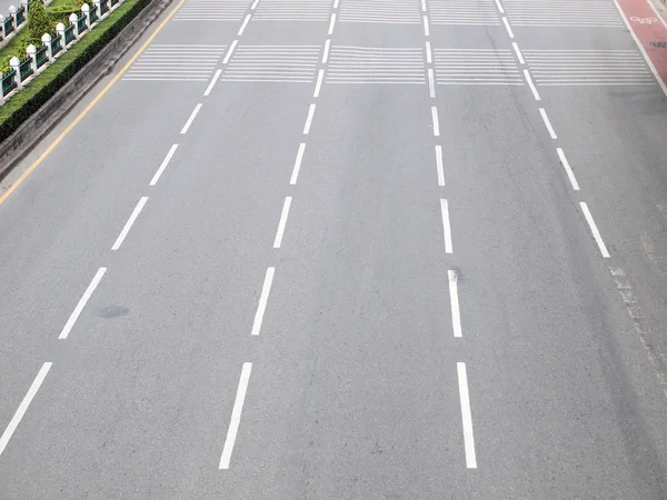 Asphalt road with white stripes — Stock Photo, Image