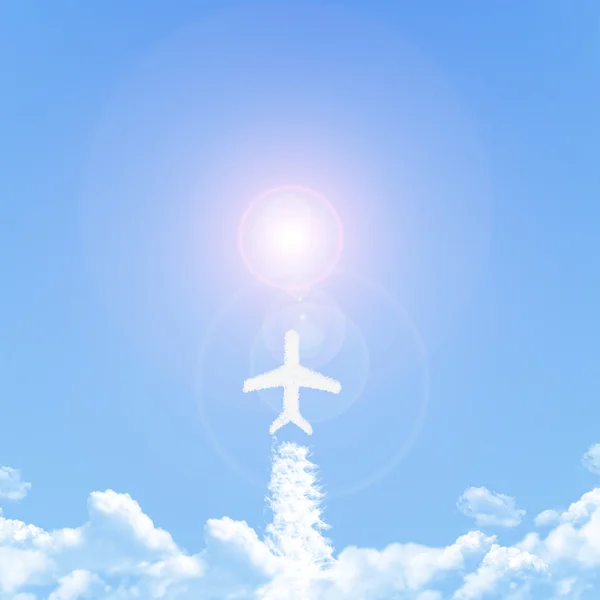 Avion sur Cloud en forme, concept de rêve — Photo