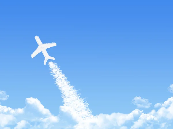 Avion sur Cloud en forme, concept de rêve — Photo