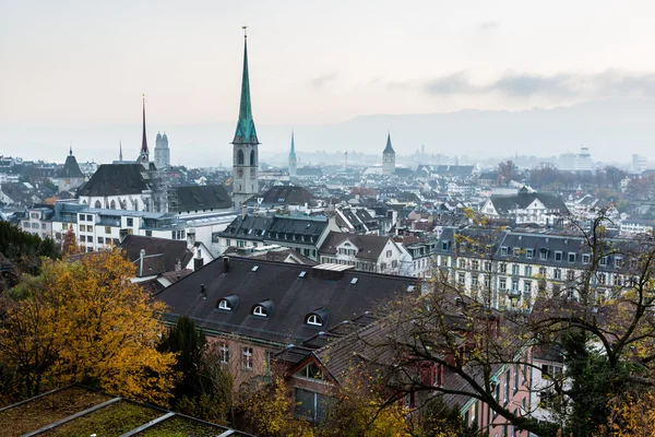 Aerial View on Tiled Roofs and Churches of Zurich at Fall, Switz — Stock Photo, Image