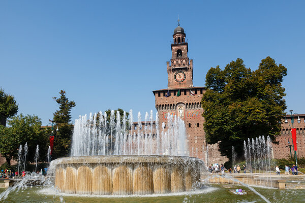 The Fountain and Sforzesco Castle in Milan, Lombardy, Italy