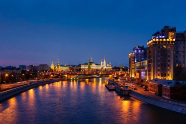 View on Moscow River Embankment and Moscow Kremlin in the Night, clipart