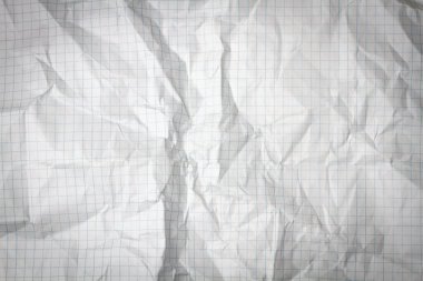 Beyaz bir kağıt. Beyaz desenli çarşaf. Eski kağıt kaplama manzara. Grunge dokusu. Yakın plan kırıklar. Kartondaki çatlaklar.