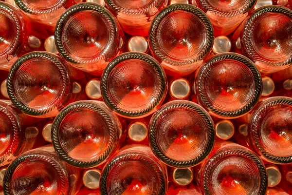 A row of champagne bottles - Wine cellar — Stock Photo, Image