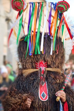 Kurent 'in renkli yüzü, Slovenya geleneksel maskesi, karnaval zamanı. Şubat ayındaki zulüm, karnavalda kullanılan geleneksel maske, Slovenya.