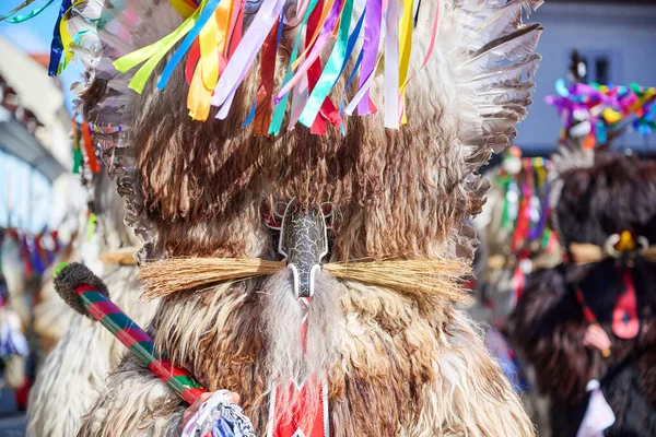 Kurent 'in renkli yüzü, Slovenya geleneksel maskesi, karnaval zamanı. Şubat ayındaki zulüm, karnavalda kullanılan geleneksel maske, Slovenya.