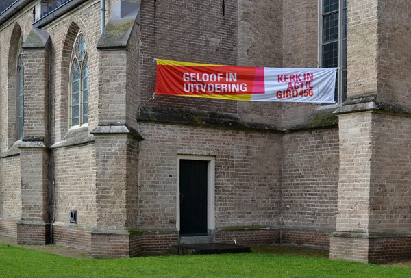 Kirche in Aktion in den Niederlanden. — Stockfoto