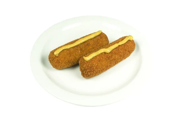 Lemez két marhahús krokettel mustárral. — Stock Fotó