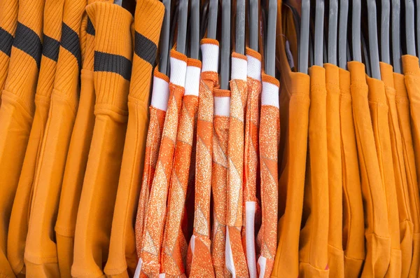 NETHERLANDS - DELFT - CIRCA APRIL 2014: Orange T-shirts of the Dutch team for sale on the market square, for the 2014 World Football Cup. — Stock Photo, Image