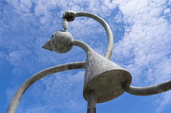 Jardim de esculturas, com esculturas do americano Tom Otterness na avenida de Scheveningen chamado "Esculturas de conto de fadas pelo mar ". Fotos De Bancos De Imagens