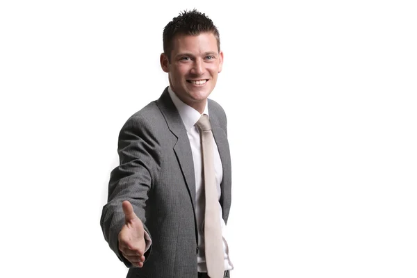 Young, handsome businessman pointing forward — Stock Photo, Image