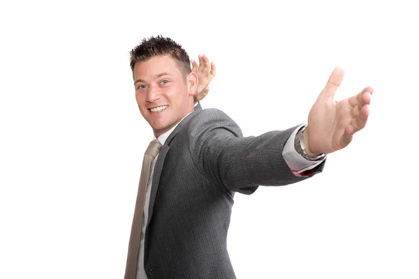 Joven, guapo hombre de negocios mostrando emoción — Foto de Stock