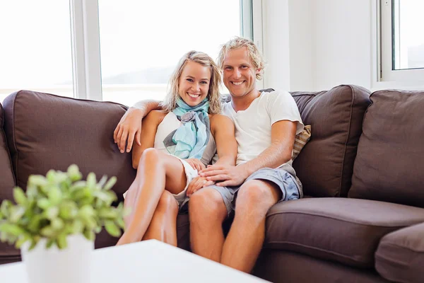 Happy young couple at home Stock Image