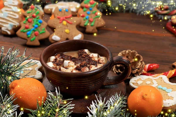 Christmas new year food, traditional gingerbread, cup of cocoa with marshmallows and homemade cookies with fir branches, cones and decorations, dish design idea, bakery concept, holiday background or postcard, selective focus,