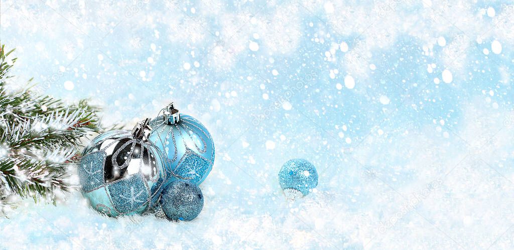 Christmas and New Year mockup for design, screen banner, festive composition with fir branches, cones and decorations on a snowy blue background with place for text, postcard,