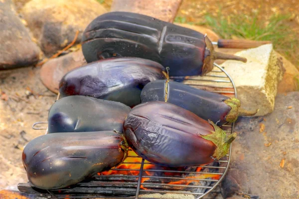 Eggplant on fire — Stock Photo, Image