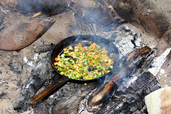 Frying pan on fire — Stock Photo, Image