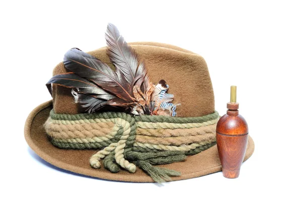Old hunting hat and game call — Stock Photo, Image