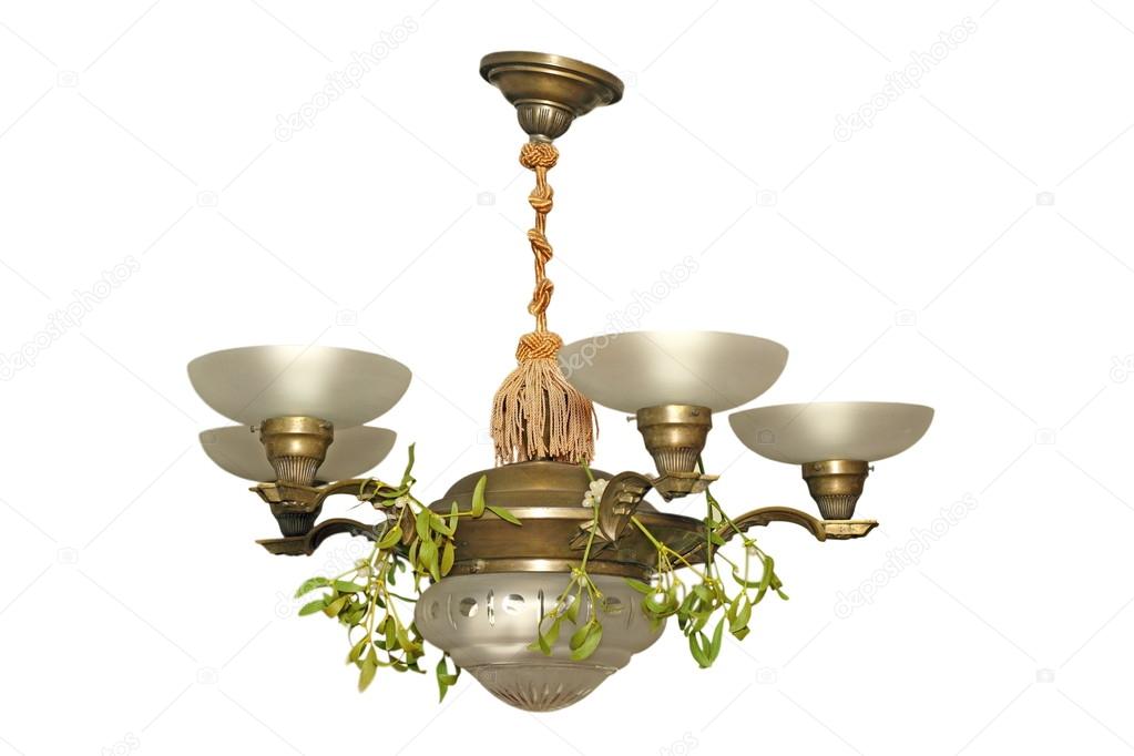 Old chandelier over white