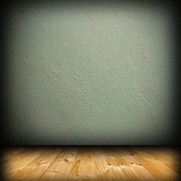 Wood floor and green plaster — Stock Photo, Image