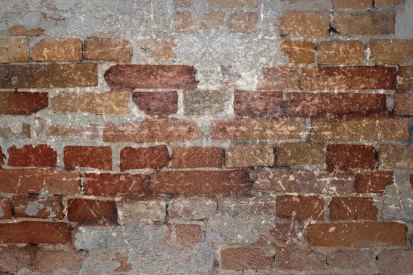 Cracked surface of brick wall — Stock Photo, Image
