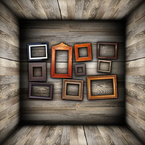 Collection of beautiful frames on wood wall — Stock Photo, Image