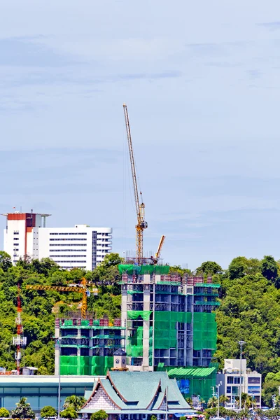 Building under construction and cranes — Stock Photo, Image