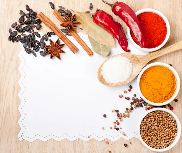 Spices on a wooden table — Stock Photo, Image