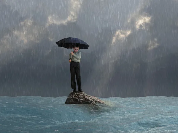 Mann mit Regenschirm in der Flut — Stockfoto