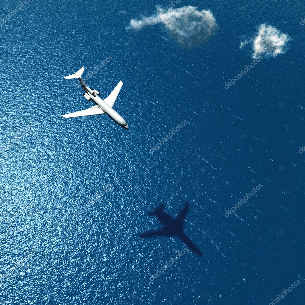 airplane flies over a sea