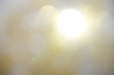 Altın parıltı. Soyut arkaplan. Işık ve bokeh.